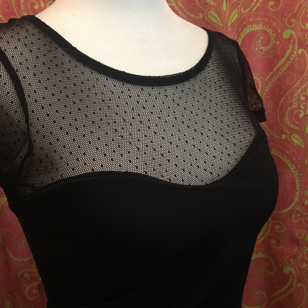 Black lacy dress.
